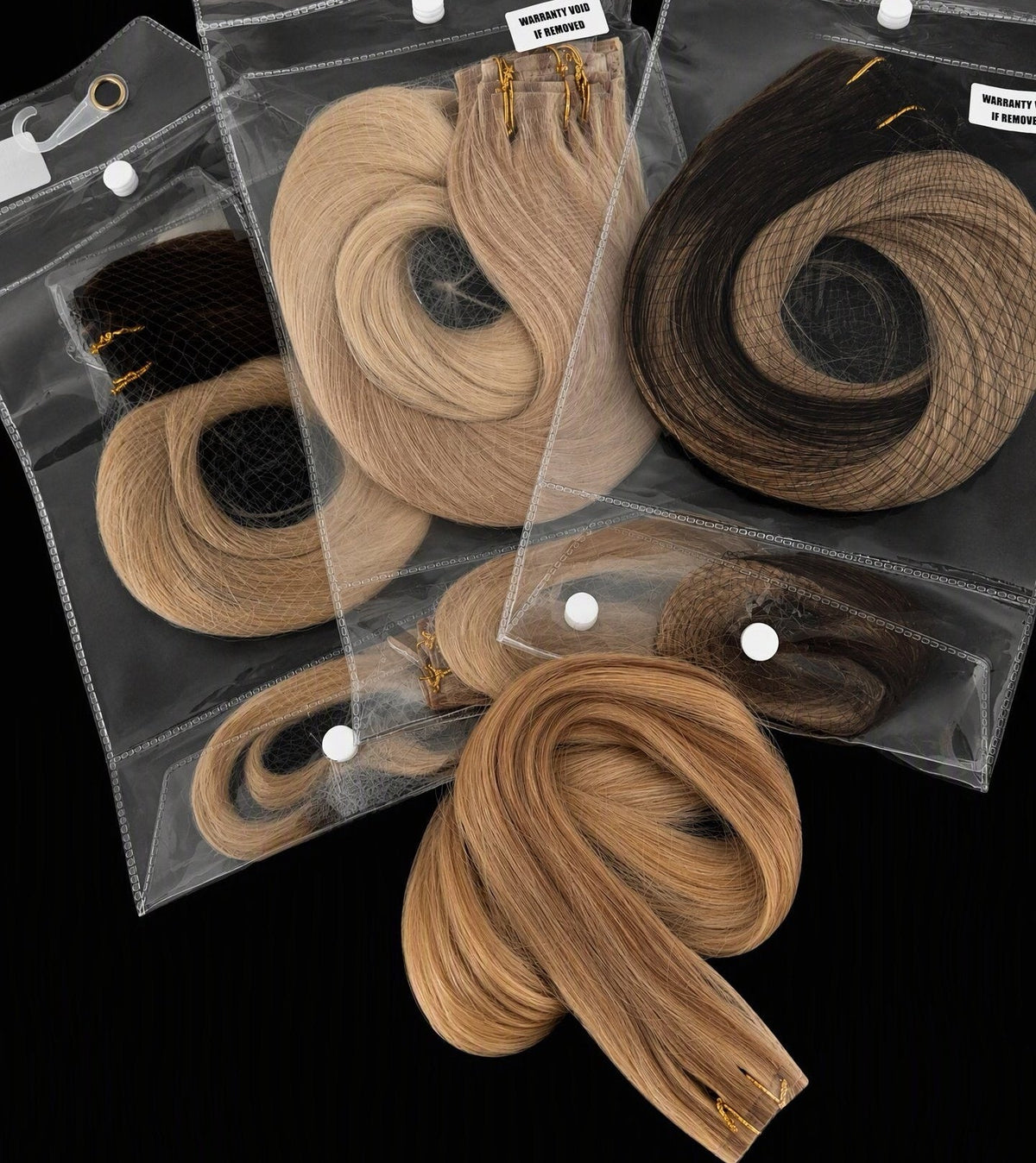 Verzegelde verpakkingen met 100% echt mensenhaar extensions in verschillende kleuren van BaddieBundlesStore